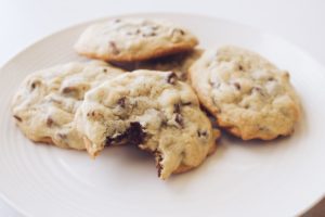 A plate of chocolate-chip cookies