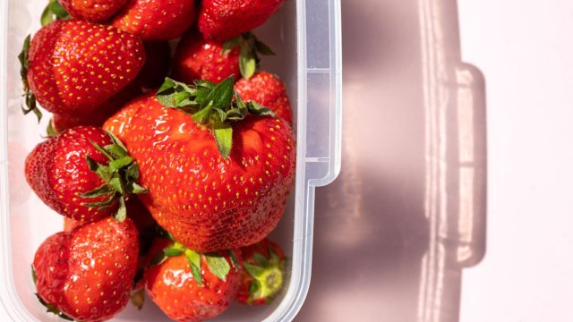 strawberries in plastic container