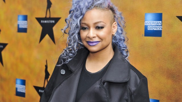 raven symone on red carpet with purple curls