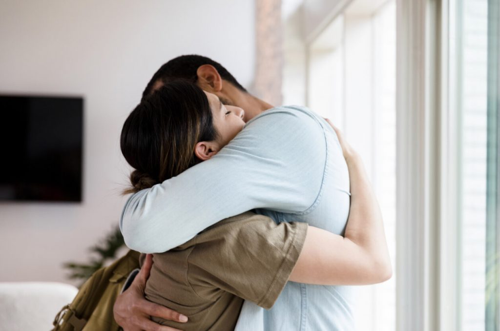 couple hugging, how to fix trust issues in a relationship