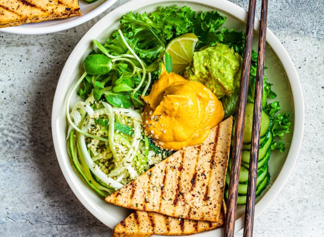 buddha bowl with zucchini pasta and grilled tofu