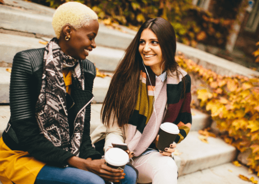 two women sitting on steps with coffee best hypothetical questions ever