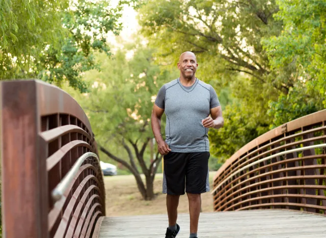 mature man doing cardio exercise, burning more fat while walking