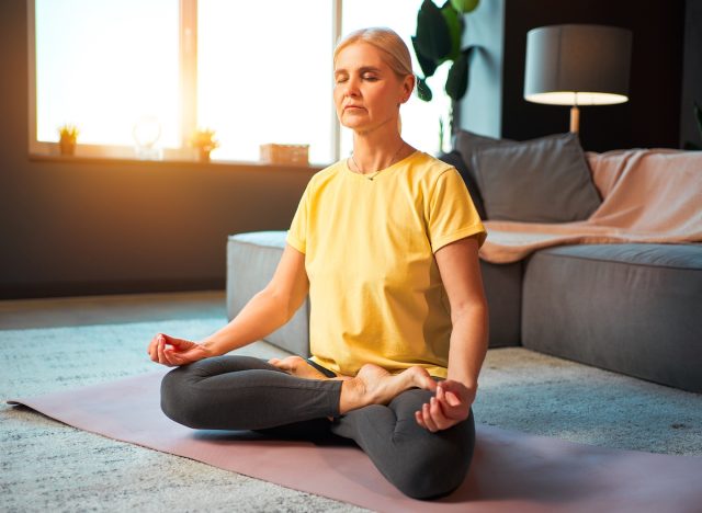 mature woman meditating