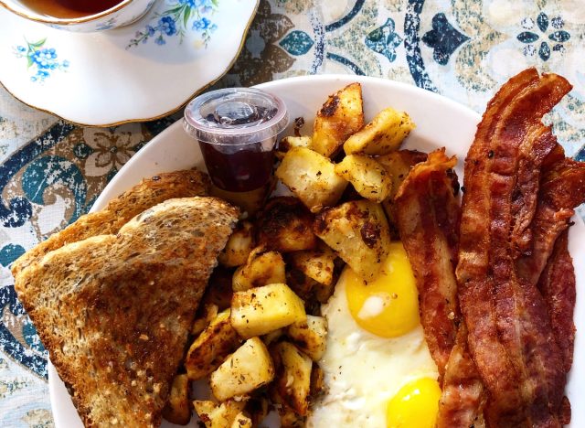 bacon, eggs, toast on plate