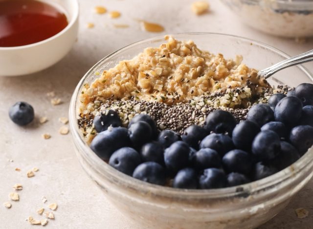 bowl of protein oats wiht blueberries and chia seeds