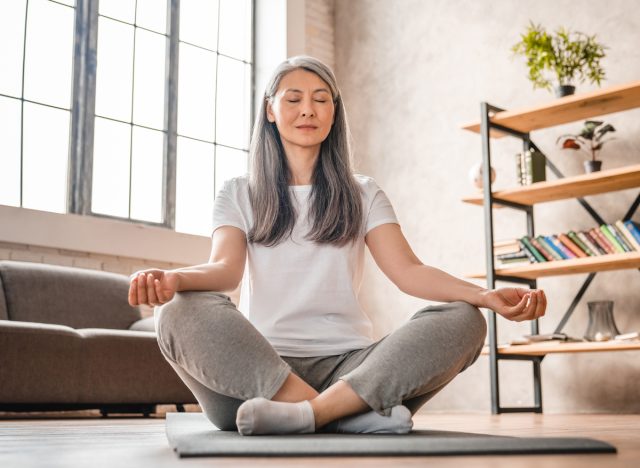 mature woman meditating