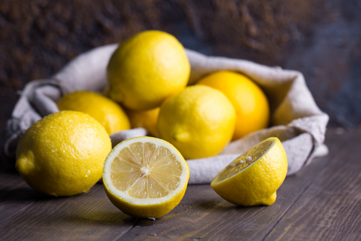 Close Up of Whole and Cut Lemons | Healthiest Fruits