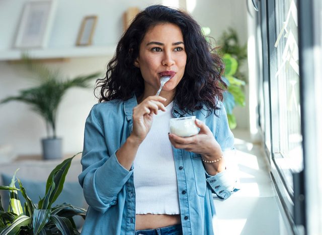 woman eating yogurt