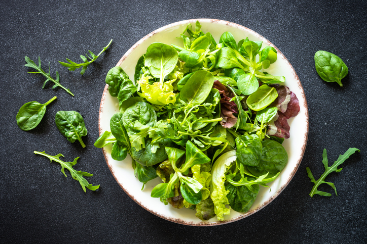 Plate of Dark, Leafy Greens | Foods that help with muscle cramps