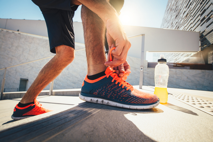 Athlete Ties Shoe During Workout | Beta-Alanine Itch