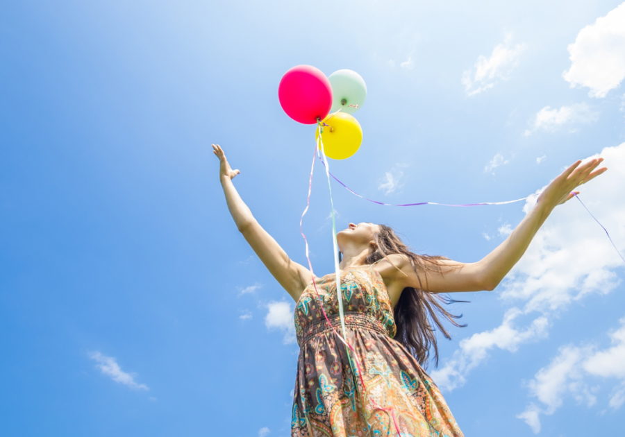 woman releasing balloons how to calm your anger