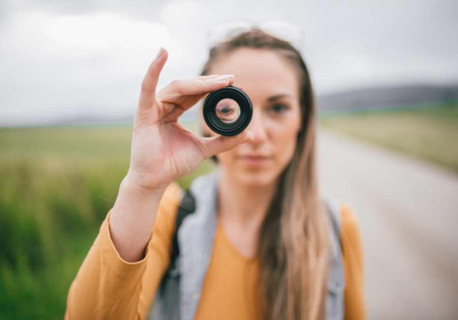 woman looking through lens how to calm your anger