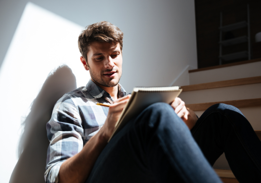 man journaling how to calm your anger