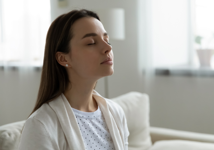 woman with eyes closed how to calm your anger