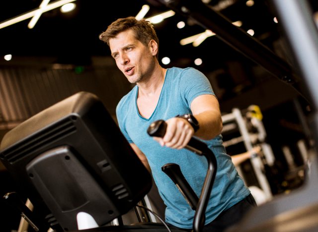 fit man on elliptical, concept of cardio exercises to stay fit as you age