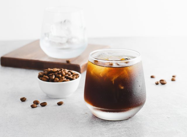 Iced Coffee, Cold Brew Coffee with Ice on Bright Light Grey Background, Refreshing Beverage