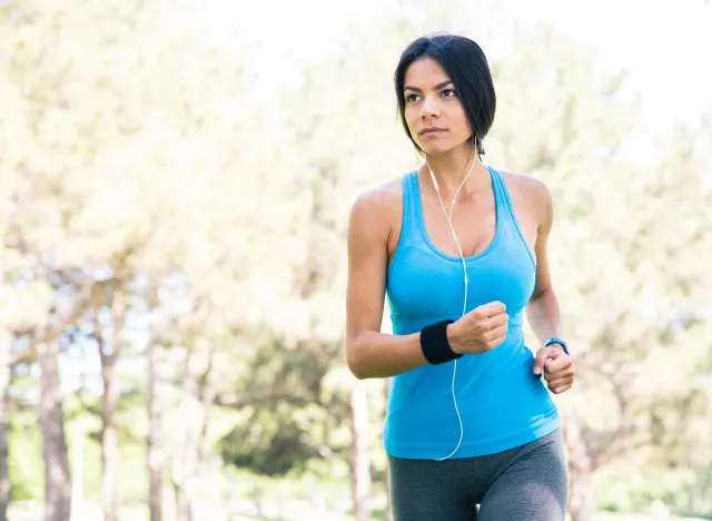 woman running, concept of workouts to deflate belly