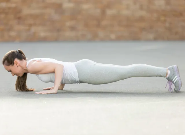 fitness woman doing pushups, concept of bodyweight exercises for lean upper body