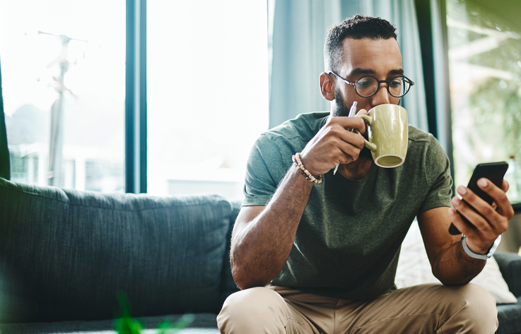 man drinking coffee at home | L-Theanine